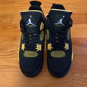 Jordan 4 thunder 2006 shoe is cracking and parts are glued